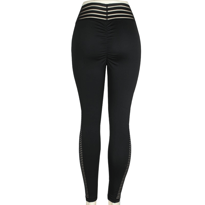 Back view of black high waist mesh leggings for women, featuring stylish patchwork and seamless design for comfort and support.